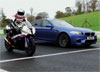 Video: 2012 BMW M5 vs BMW S1000 RR