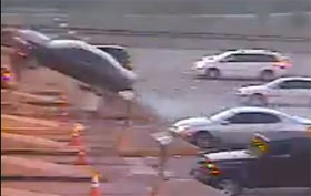 Drunk Driver Shoots Car Off Toll Booth Video