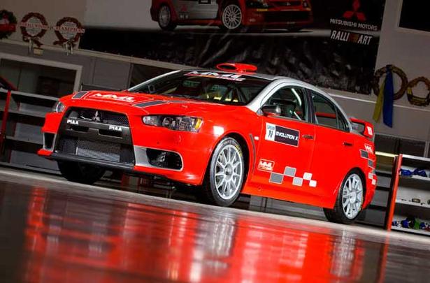 Alister McRae drives Mitsubishi Evo X WRC