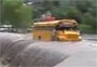 Video: School Bus Crosses Raging River