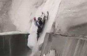 Video: Incredible Snowmobile climb