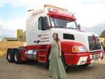Girl goes to prom in Volvo NH12 460 truck