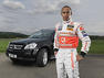 Hamilton drives a Mercedes GL Photos