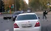 Chuck Norris Motorcyclist Lands On His Feet After Crash