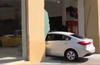 Kia Cerato Crashes Ferrari Dealership