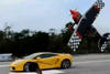 Lamborghini Gallardo vs Stunt Plane