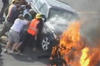Real Life Heroes Lift Flaming BMW Off Motorcyclist