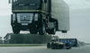 Renault Semi Truck Jumps Over Lotus F1 Race Car