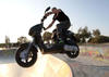 Scooter Visits Skatepark