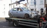 Angry Driver Flies Car Off Tow Truck