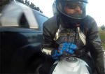 BMW S1000 RR Rubs Shoulders With Black SUV