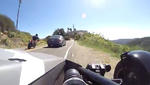 Fast Reactions Help Ariel Atom and Biker Avoid a BMW