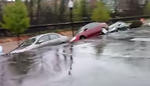 Landslide Takes Out Dozens of Cars