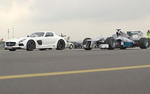 Mercedes SLS AMG Black vs Petronas F1 Car