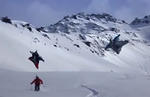 Wingsuit Flying Over Skiers